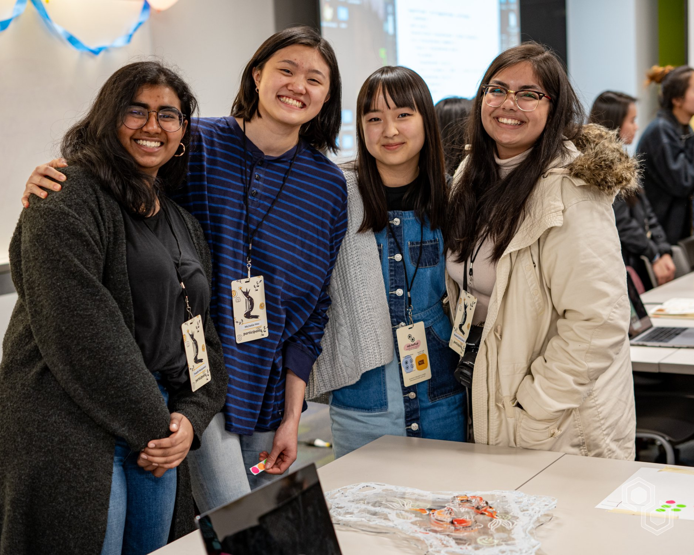 A picture of 4 participants at BuildGT, one of the hackathons that HackGT throws every Spring.